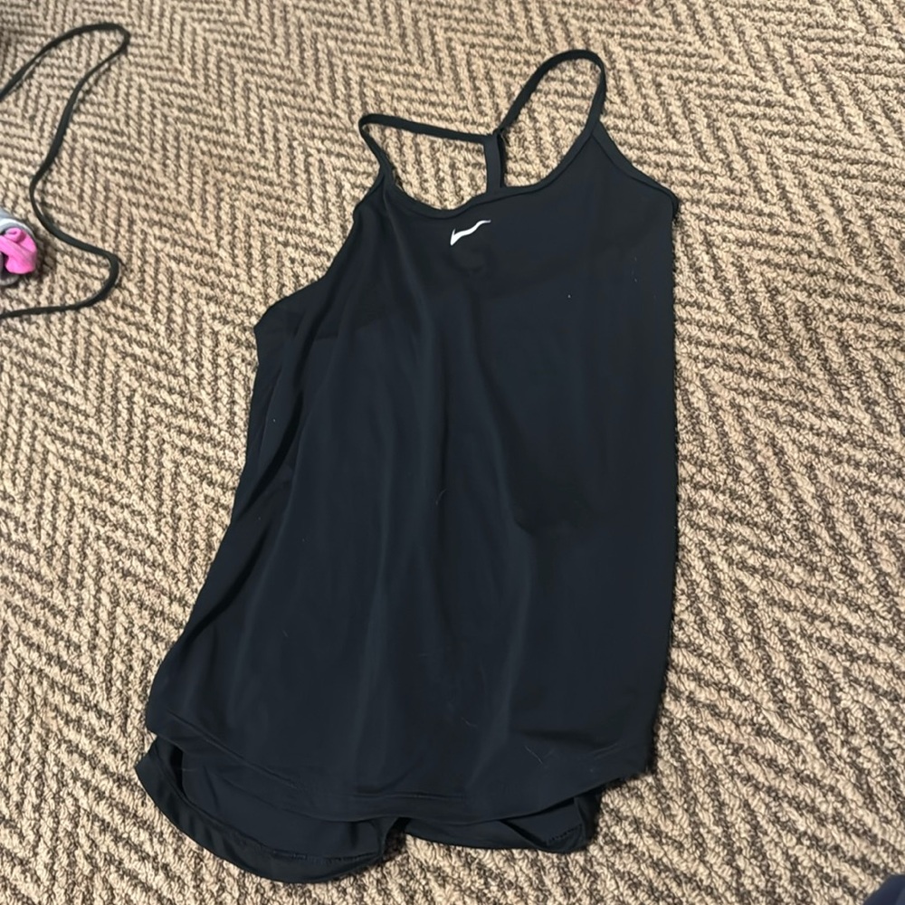 A black Nike workout tank top